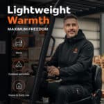 Lifestyle image of a heated work hoodie worn by a forklift driver in a warehouse, lightweight black design for work, outdoor activities, and daily use.