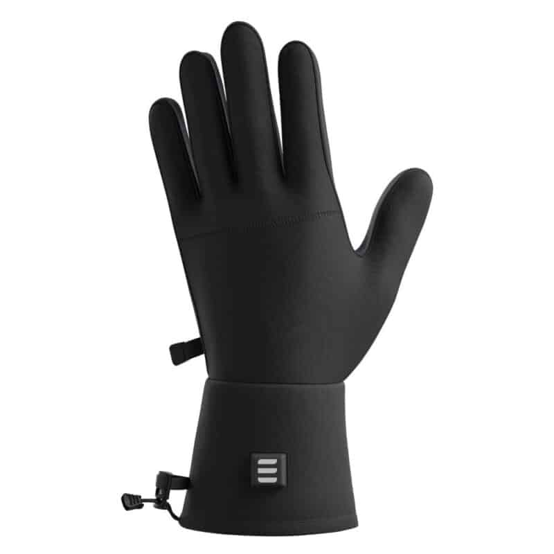 Front view product photo of black Magnetar heated glove showing smooth outer shell, battery indicator button and adjustable cuff for cold outdoor use